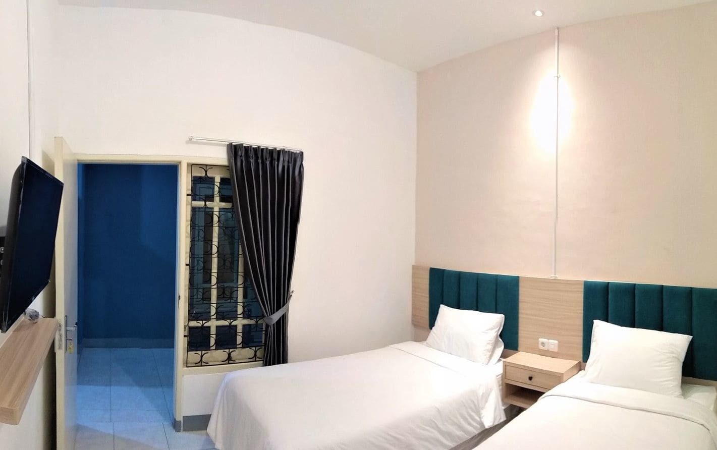Kokonut Guesthouse Surabaya Buitenkant foto